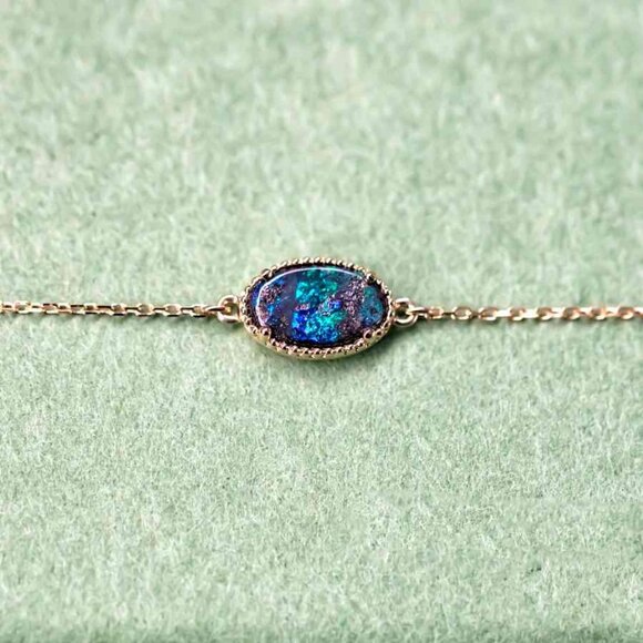 Oval Shaped Australian Boulder Opal Bracelet in 18K Yellow Gold - Picture 1 of 5